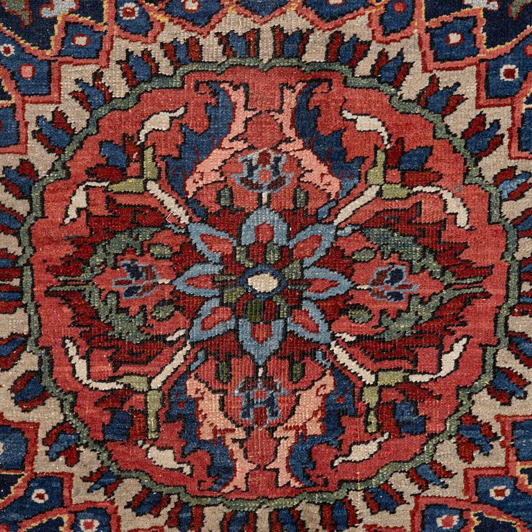 A semi-antique Ahar carpet, c 335 x 275 cm.