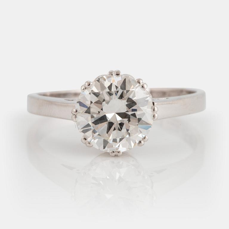 An 18K white gold ring set with a round brilliant-cut diamond weight 2.07 cts according to engraving.