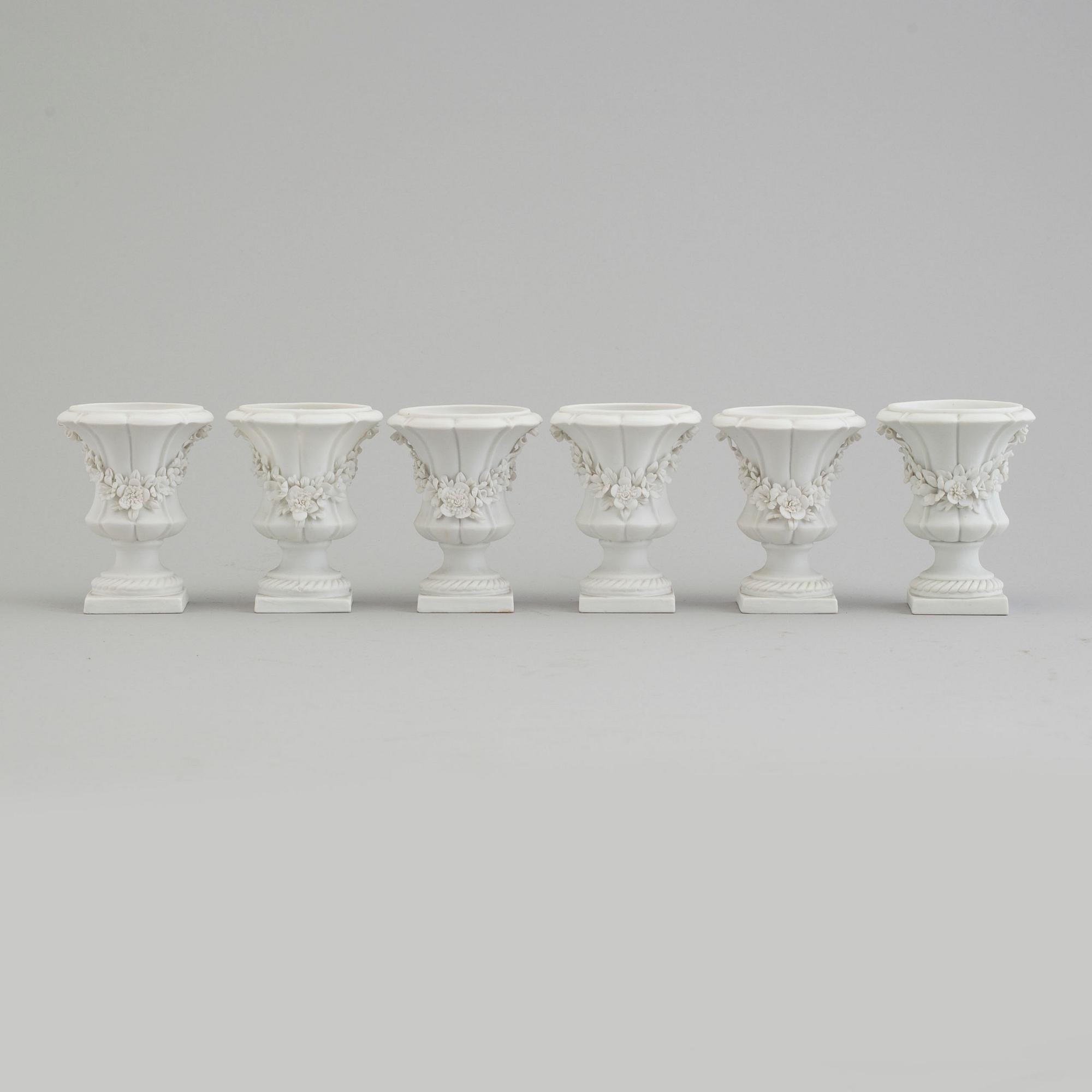 Six bisquit porcelain miniture vases, circa 1900, with Sevres like mark.