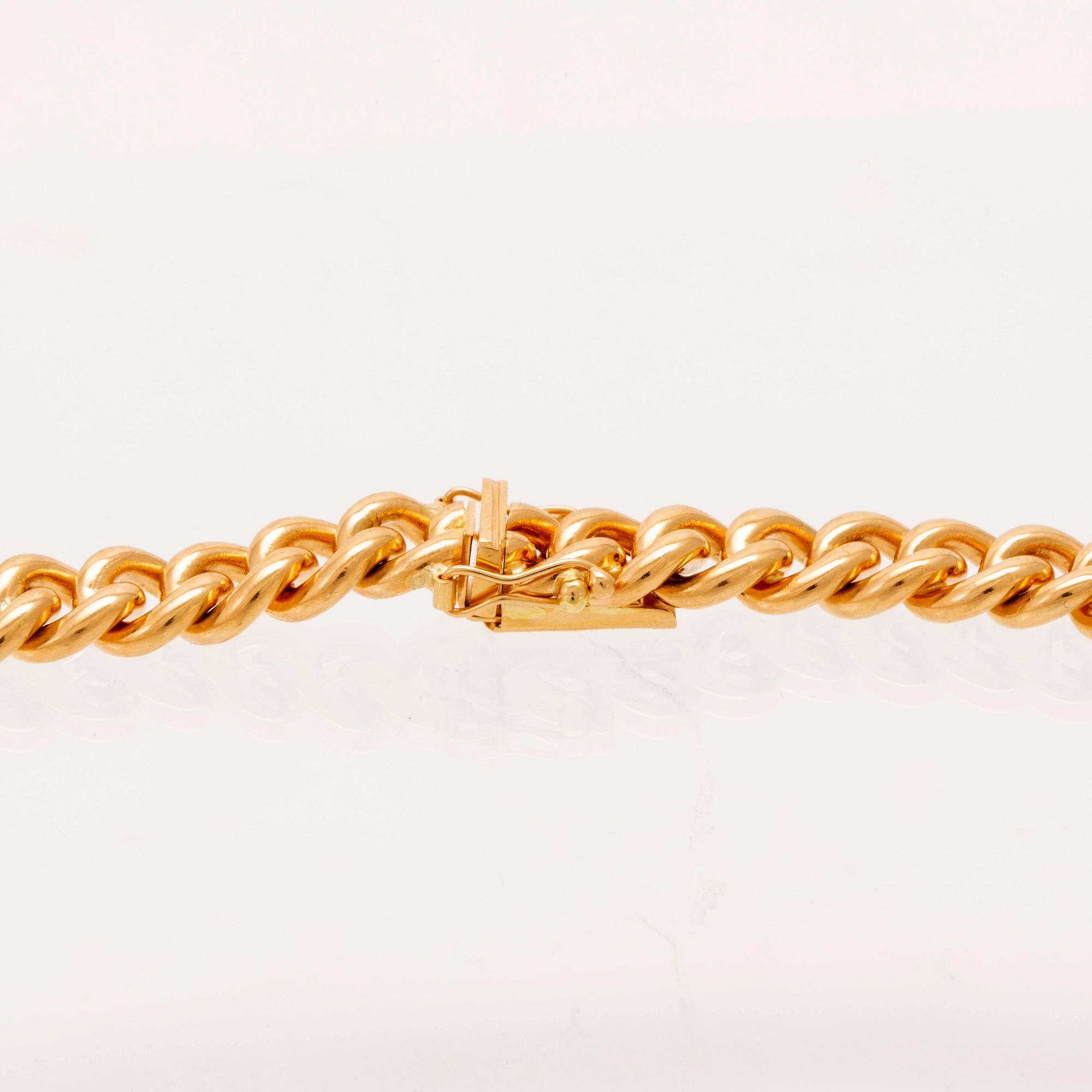 An 18K gold necklace weight 183,6 grams, 0,4 ct brilliants.