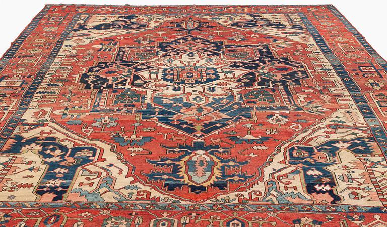 An antique Heriz/Karadja carpet, c. 430-450 x 335 cm.