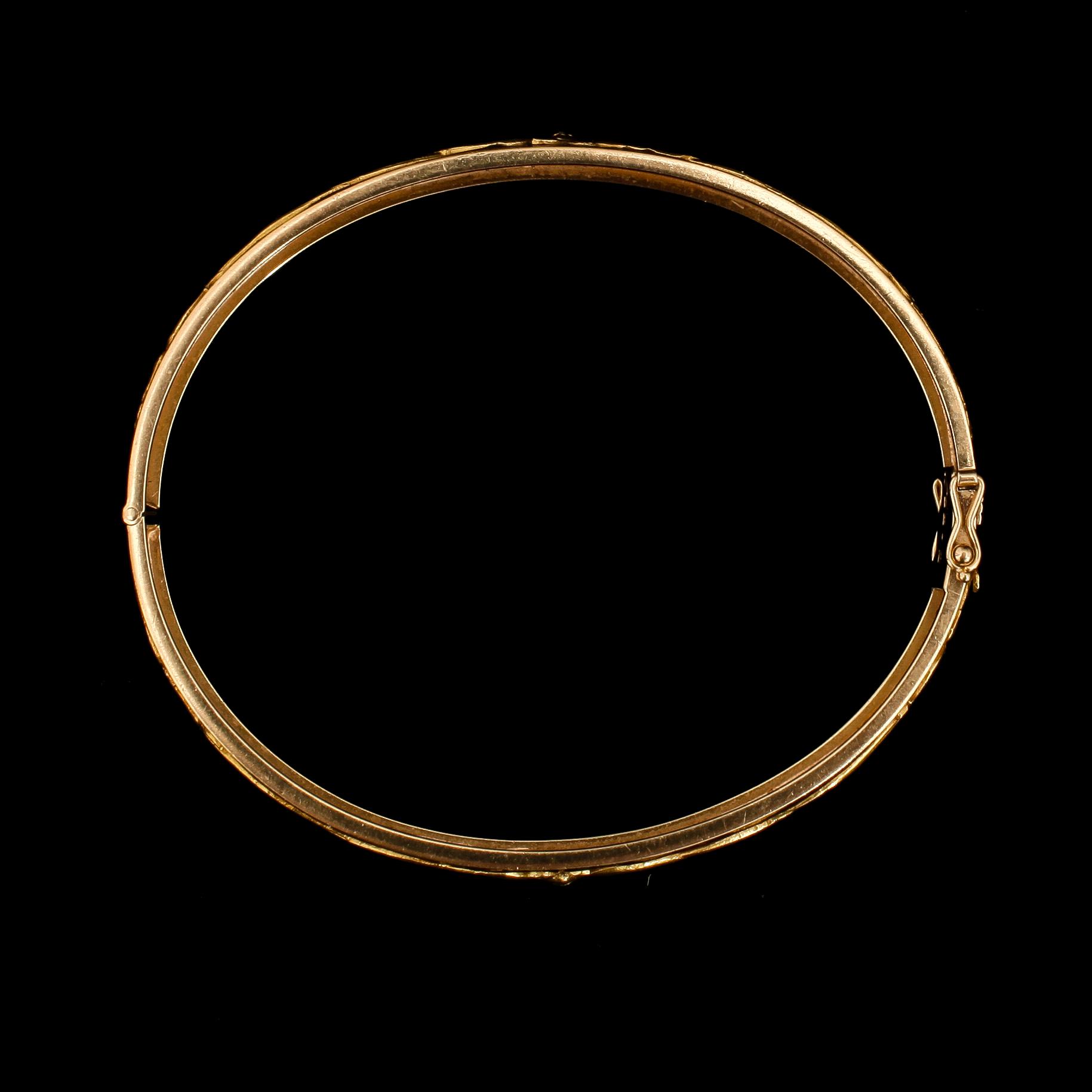 ARMRING, 18k guld. Gunnar Fahlström, Stockholm 1964. Monteringar Jugend, franska stpl. Vikt 29,5 g.