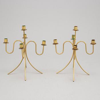 Gunnar Ander, a pair of five-light brass candelabra from Ystad Metall.