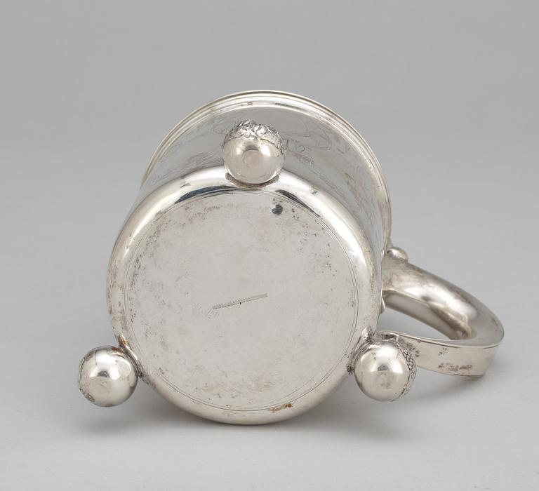 A Baroque style tankard with no silver marks.