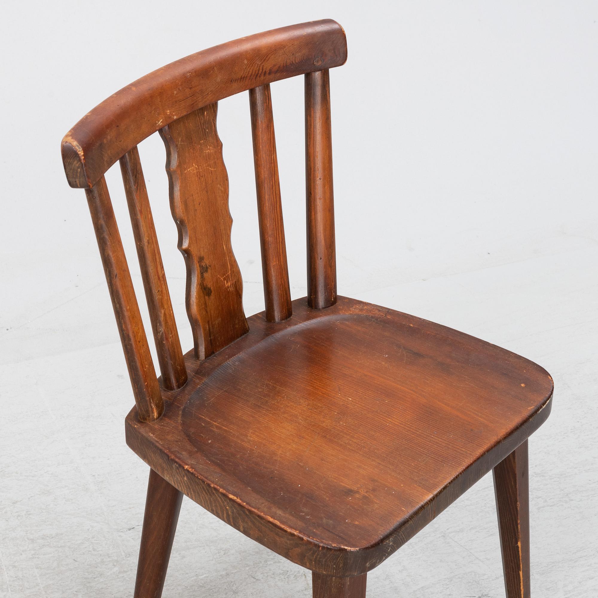 A set of four stained pine chairs from Åby Möbelfabrik, 1940s.