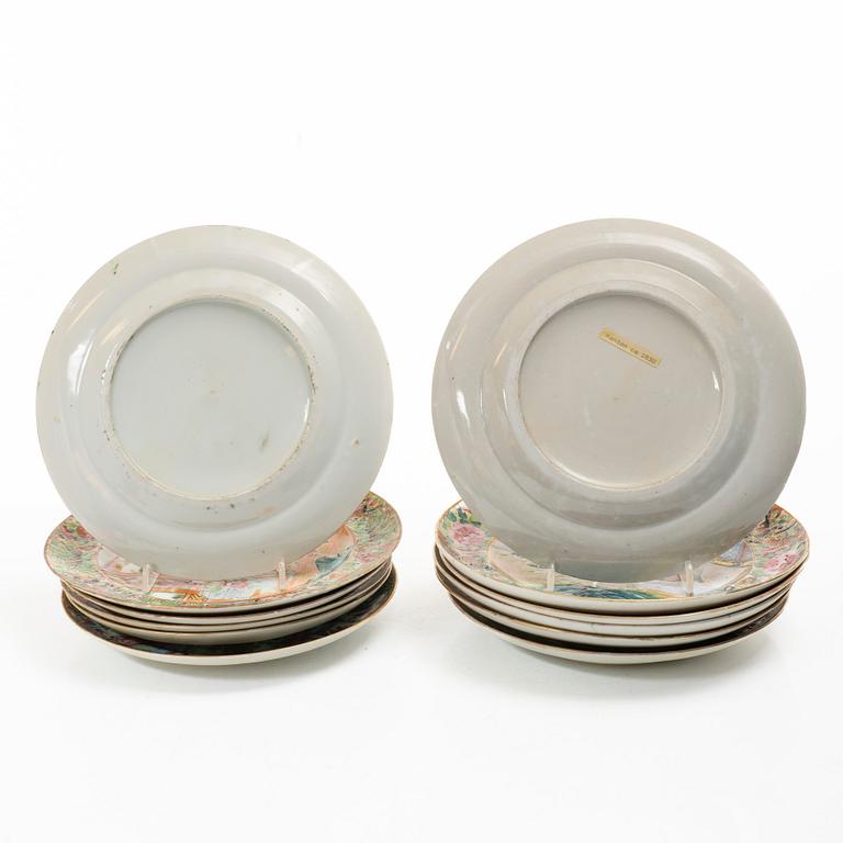 A matched set of 14 famille rose 'Canton' dinner plates, Qing dynasty, 19th century.