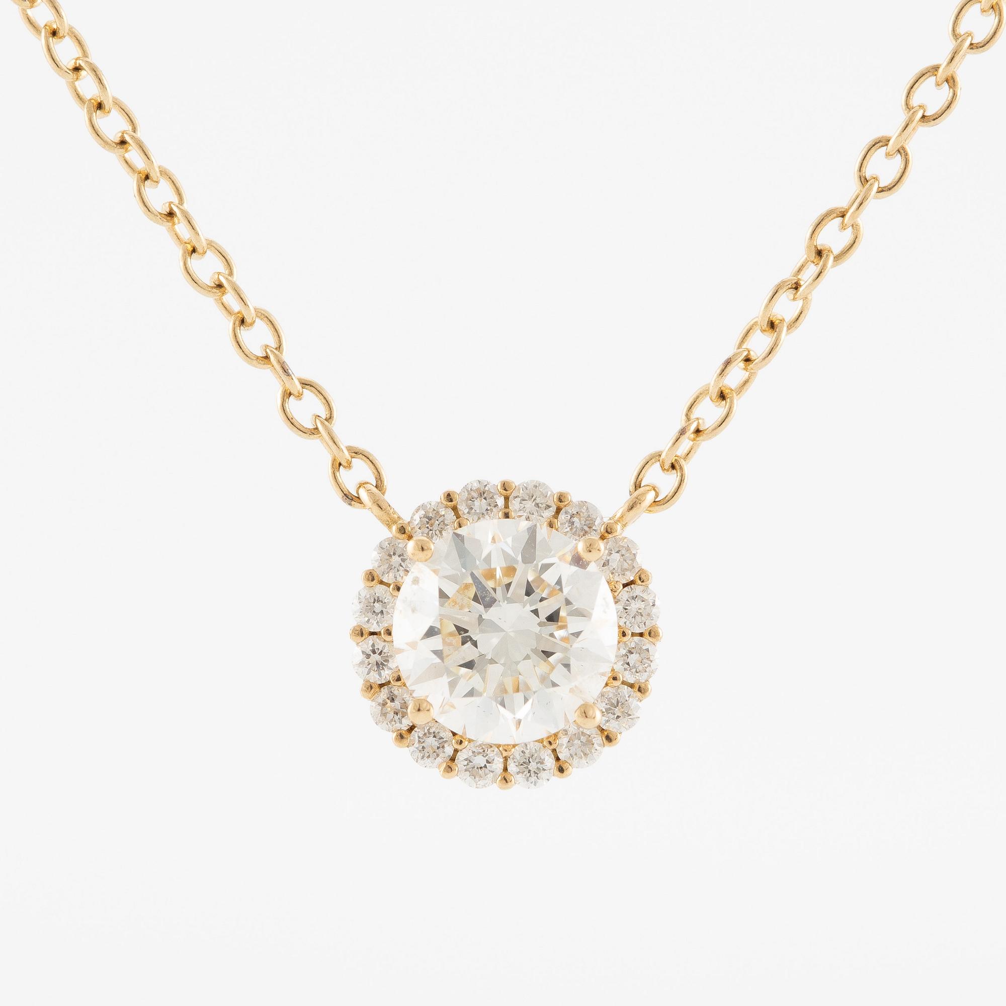 Collier 18K guld med briljantslipade diamanter.