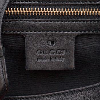 GUCCI, a black leather shoulder bag, "Jackie".