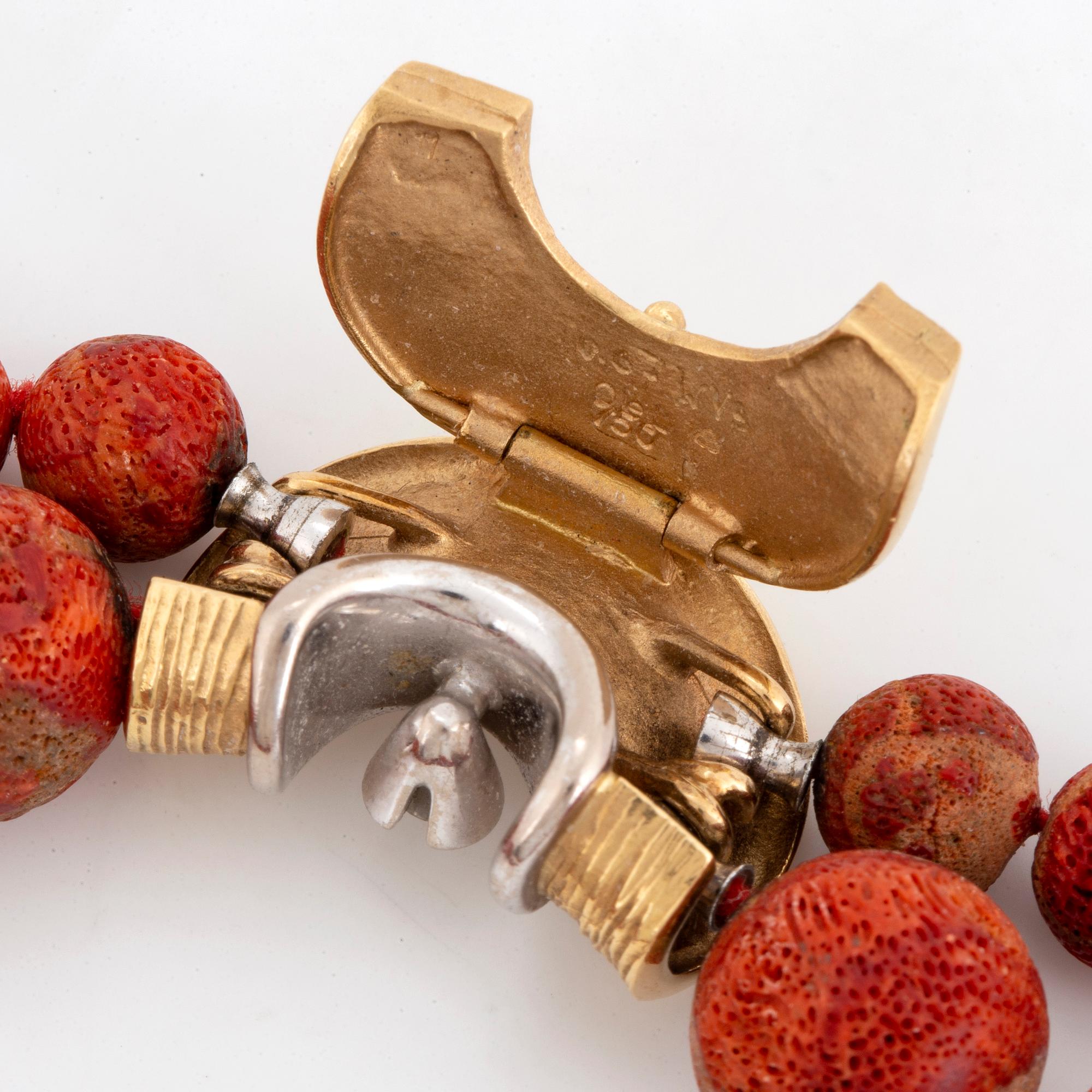 OLE LYNGGAARD, coral bead necklace, clasp with diamond.