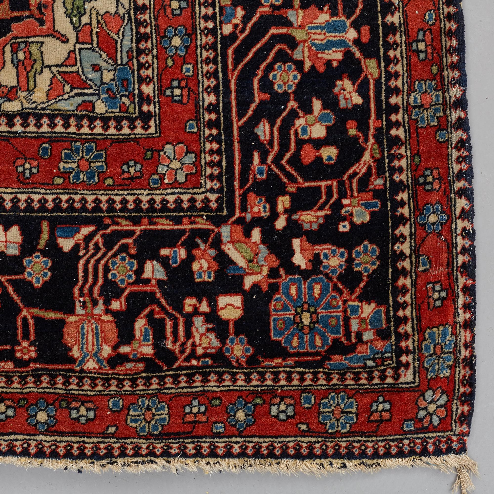A RUG, a semi-antique Kashan Motachem, ca 217,5 x 134 cm.