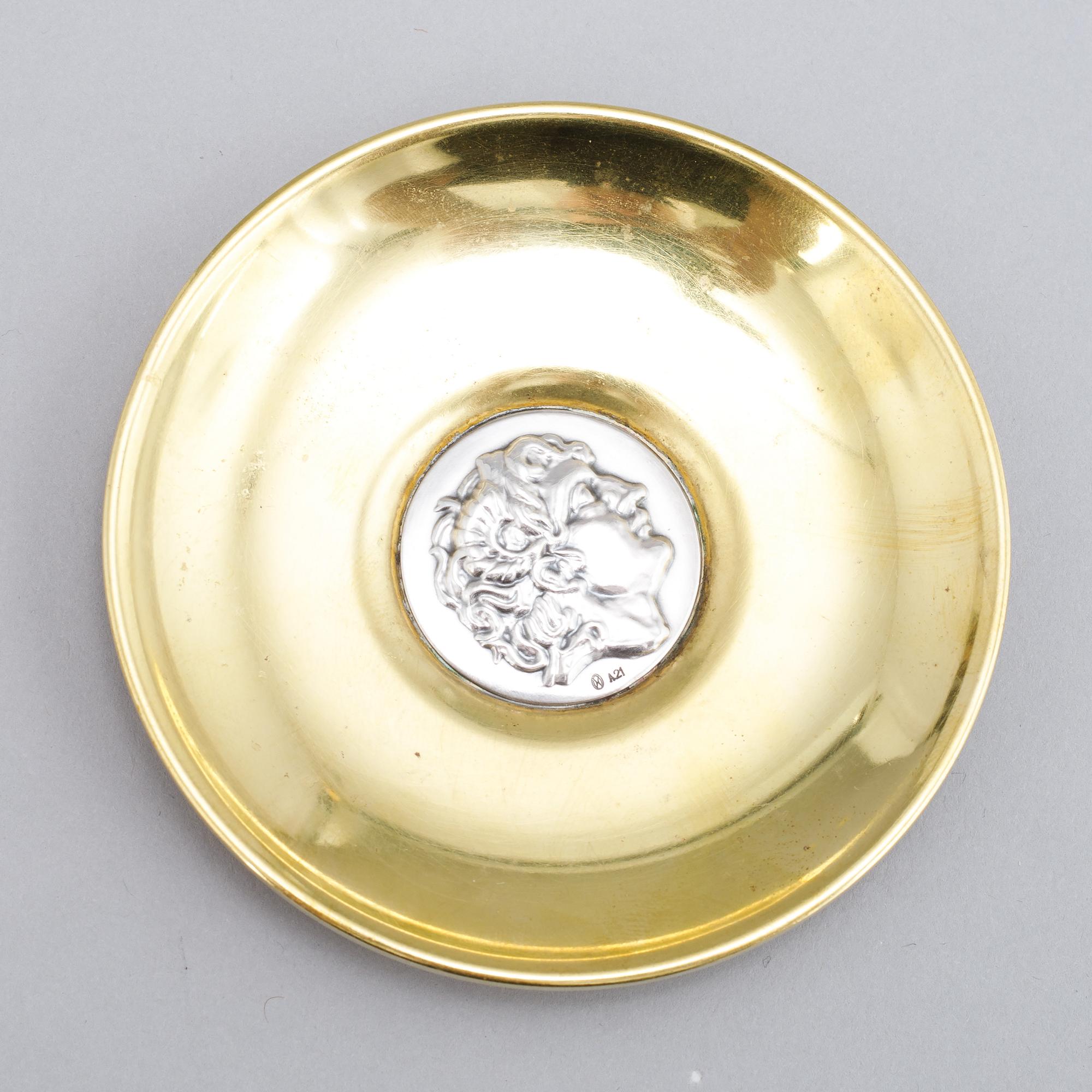 Five silver plates by Ilias Lalagounis, Greece.