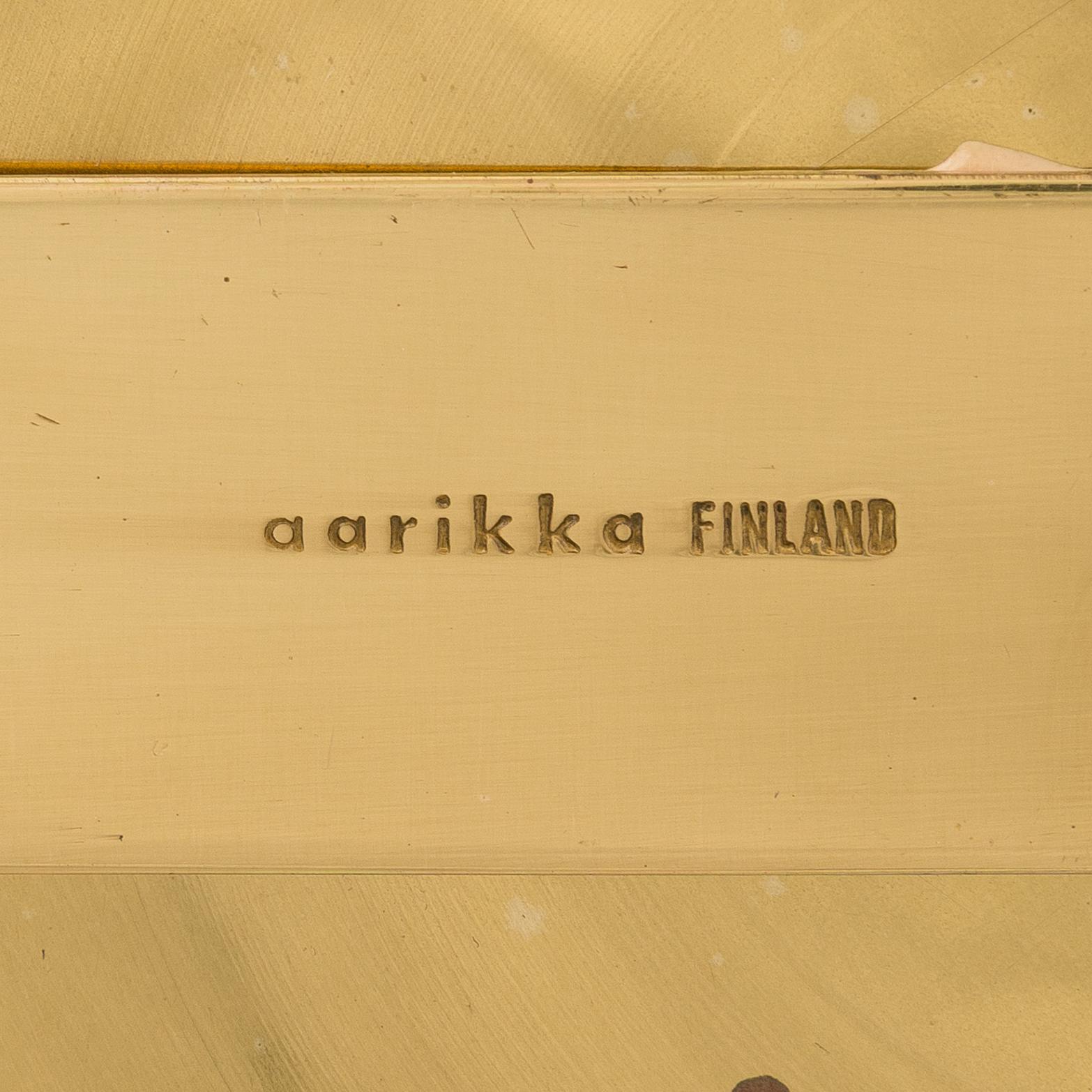 Kaija Aarikka, a late 20th century wall sconce for Aarikka Finland.