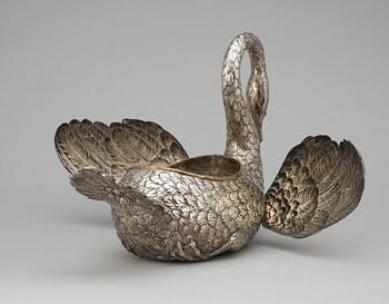 A German silver flower stand in the shape of a swan.