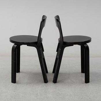 ALVAR AALTO, a pair of painted model 65 chairs from Artek, Finland.
