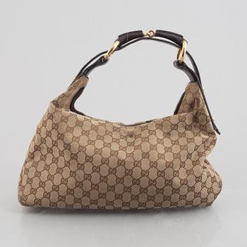 Gucci, a handbag.