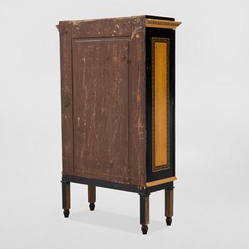 A North-European painted neoclassical cabinet, early 19th century.