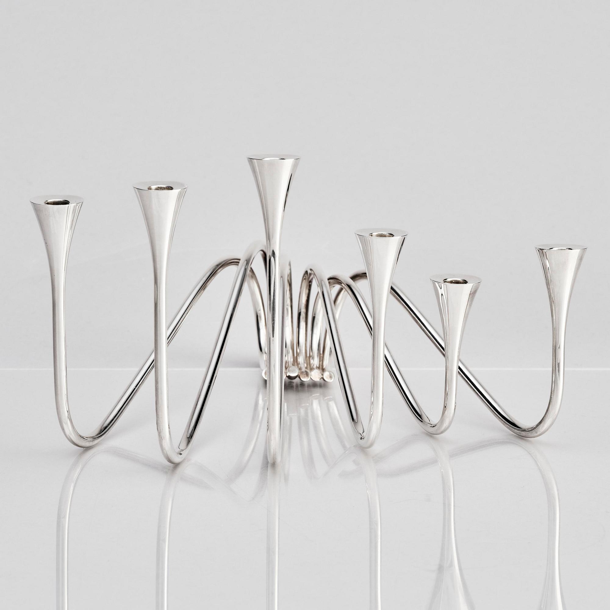 Ibi Trier Mørch, a pair of "Bølgeslag" six-branched sterling silver candelabra for A. Michelsen, Denmark 1951.
