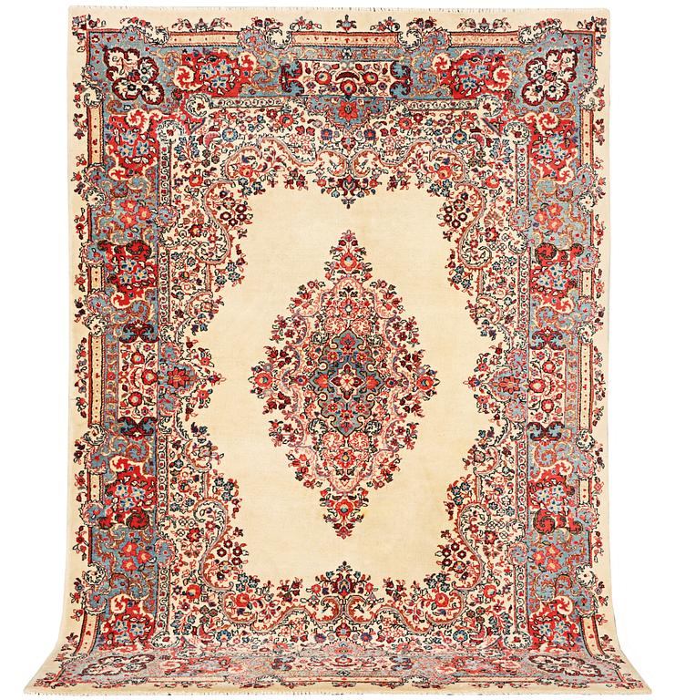 A Kerman carpet, c. 270 x 187 cm.