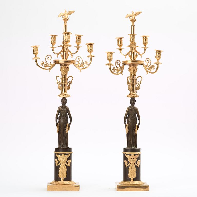 A pair of Empire early 19th century six-light candelabra.