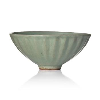 1071. A celadon glazed 'lotus' bowl, Yuan/Ming dynasty.
