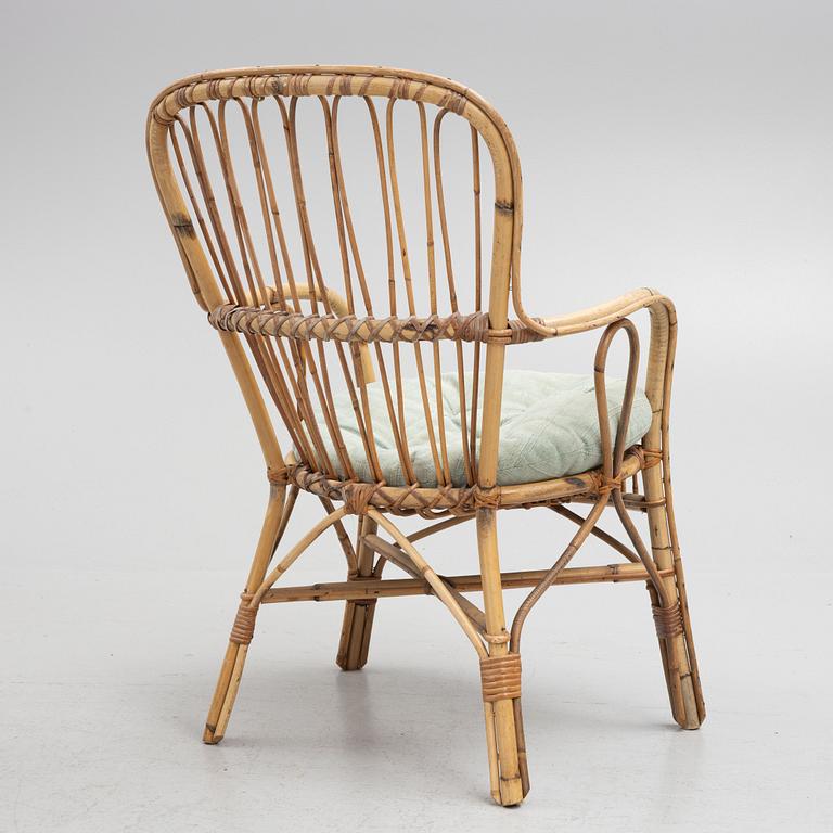 A wicker chair, mid 20th century.