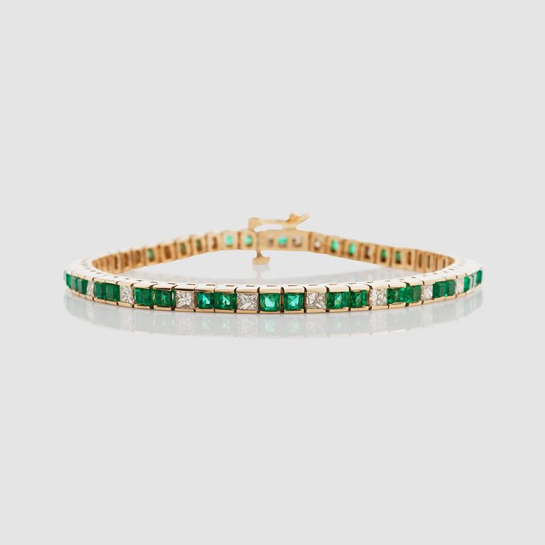 A step-cut emerald and princess-cut diamond bracelet.