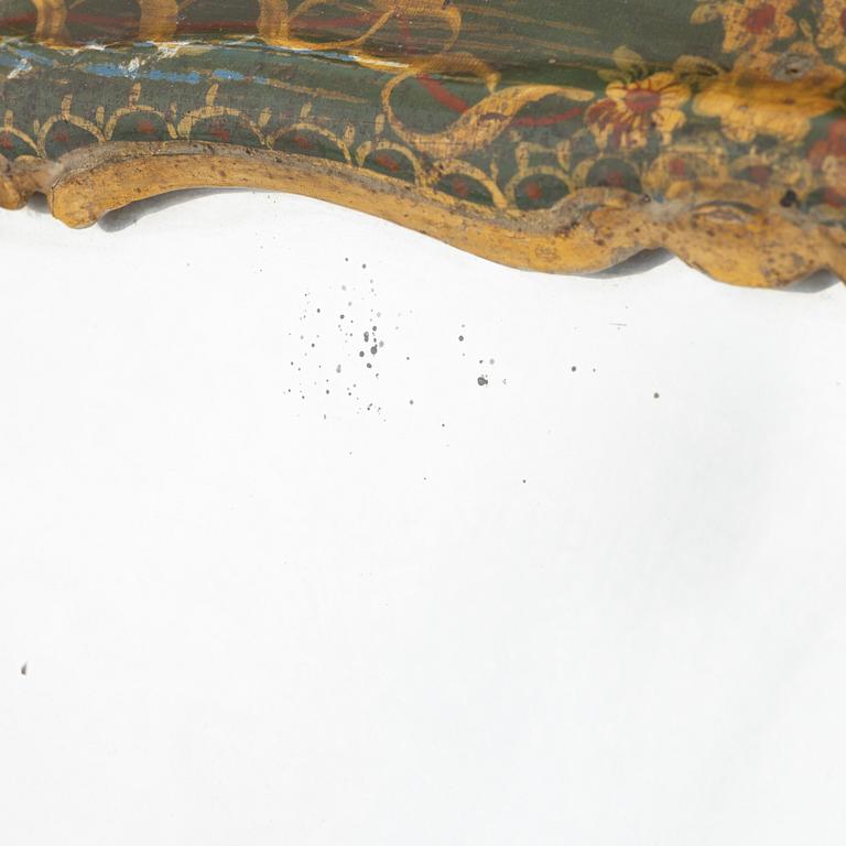 A Rococo style table mirror, probably southern Europe, around the year 1900.