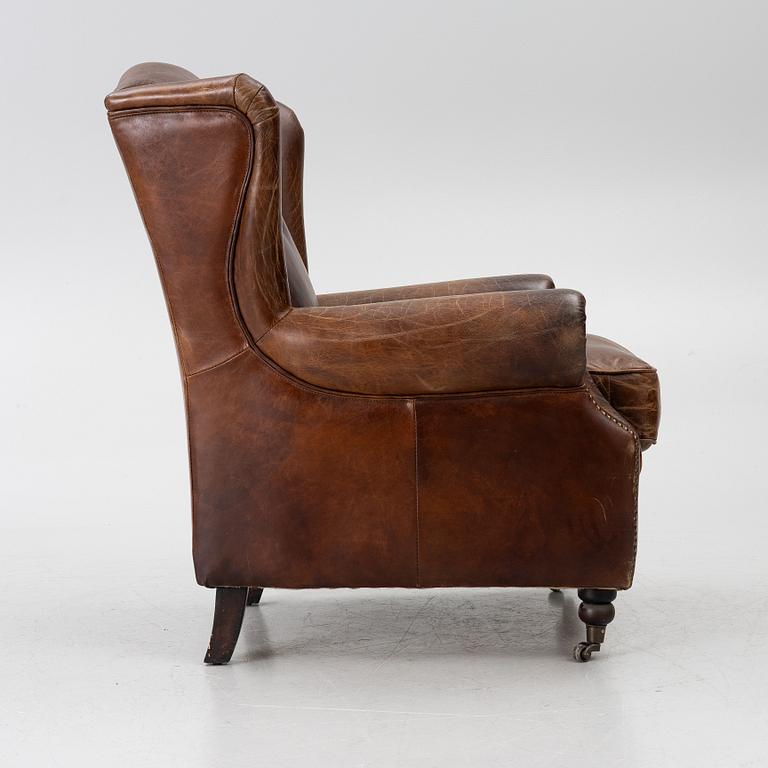 An armchair, contemporary.