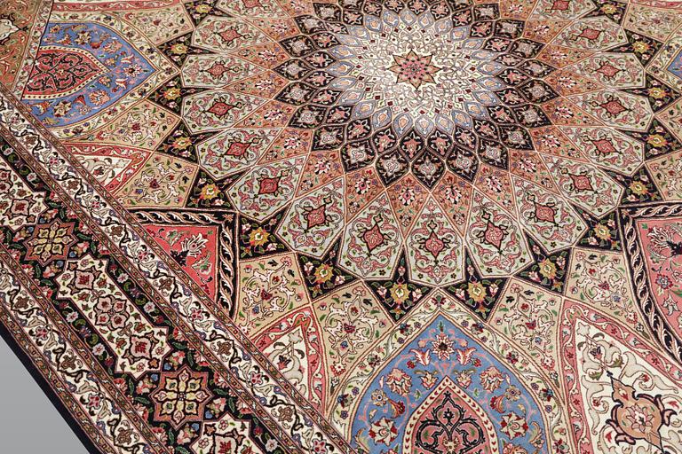 A part silk Tabriz carpet, so called 50 Radj, c. 300 x 250 cm.