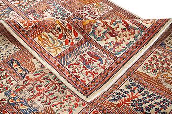 A Kashmar carpet, c. 391 x 291 cm.