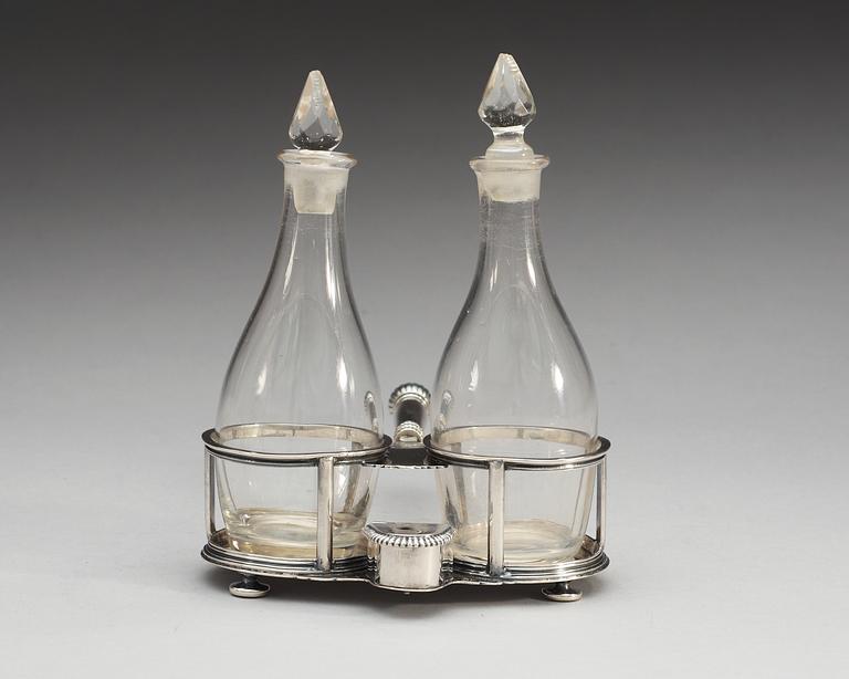 A German early 18th century silver cruet-set, makers mark of  Johann P. Riblinger, Augsburg 1708-1710.