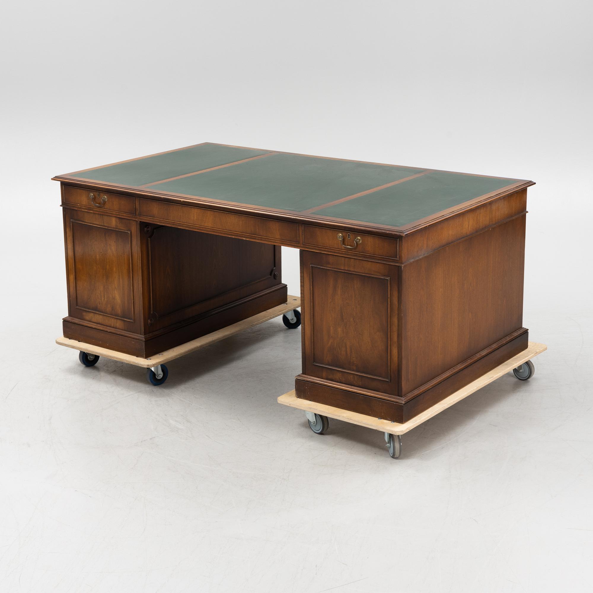 A 20th century Bevan Funnell Ltd Reprodux desk, England.