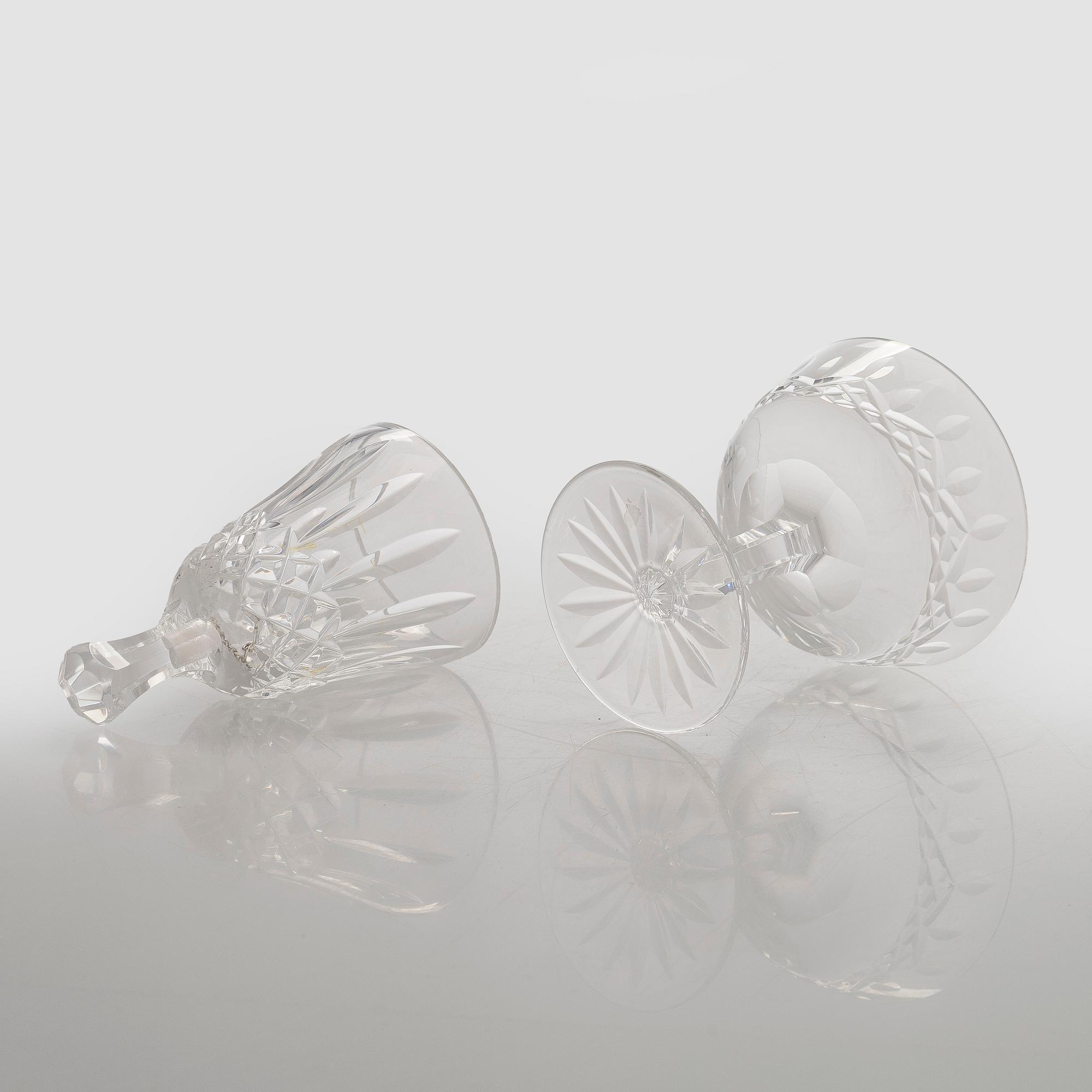 A set of 13 dessert bowls / champagne glasses, Waterford. and a table clock.