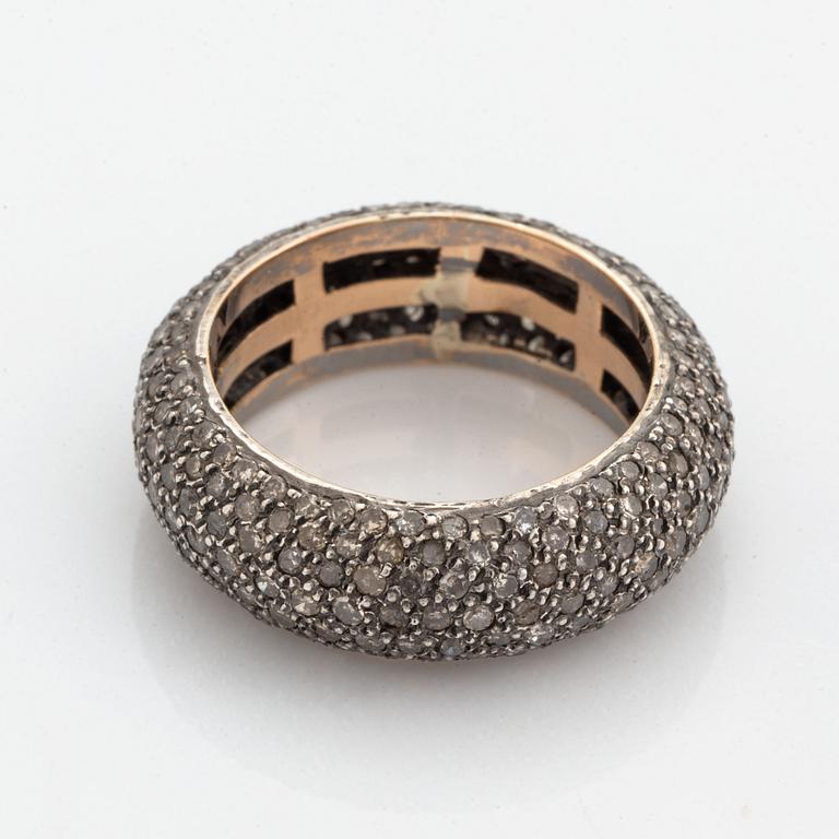 Silver and diamond ring.