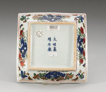 A wucai square dish, Ming dynasty, Jiajing´s six character mark and period (1522-66).