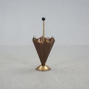 PARAPLYSTÄLL, 1900-talets andra hälft.