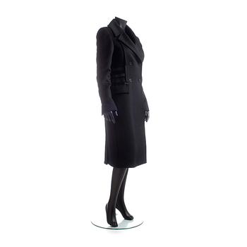 GUCCI, a black wool blend coat.
