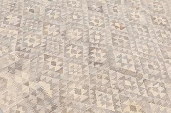 A carpet, kilim, ca 287 x 218 cm.