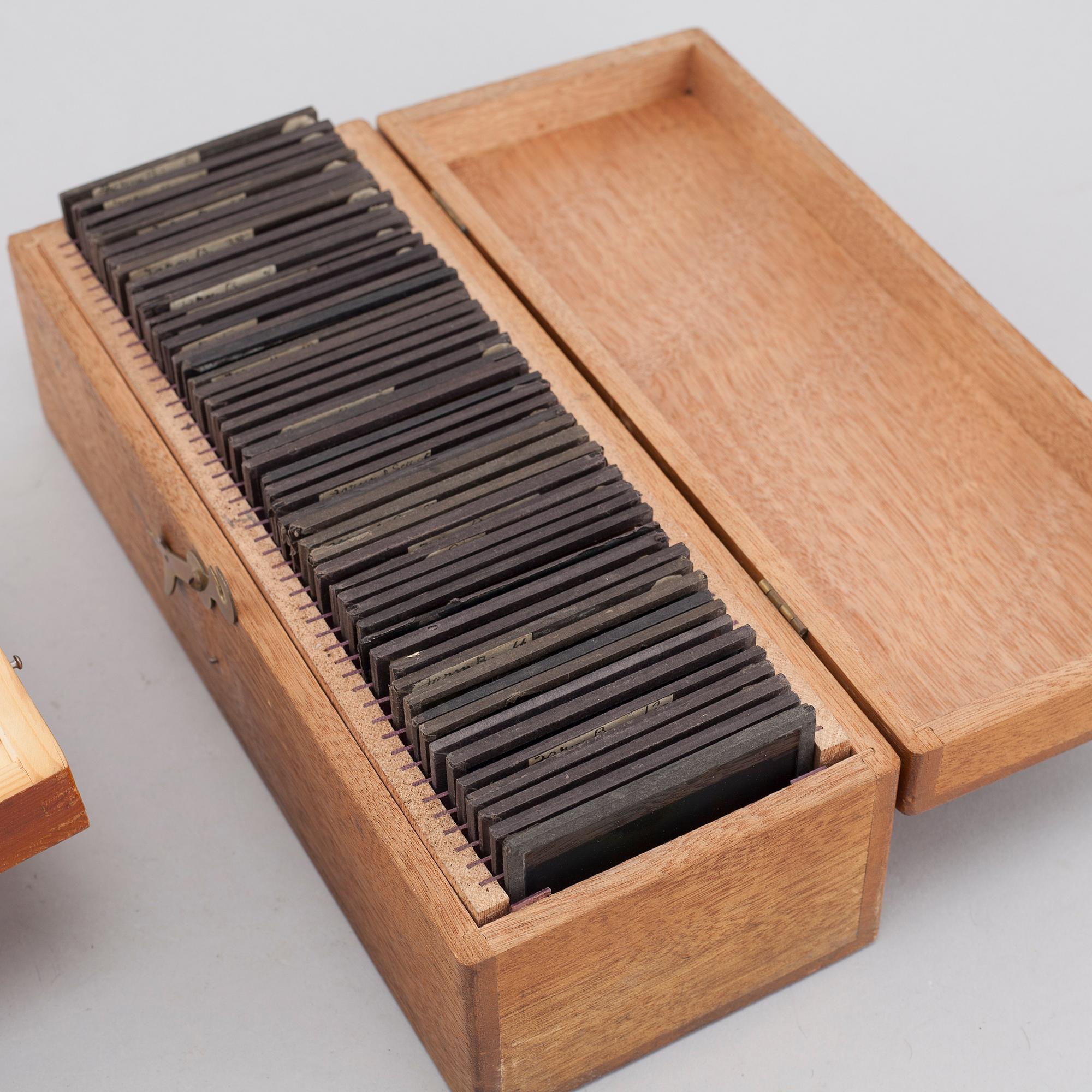 Circa 60 early 20th century lantern glass slides.