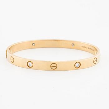 CARTIER, Love bracelet with four brilliant cut diamonds ca 0.40 ct in total.