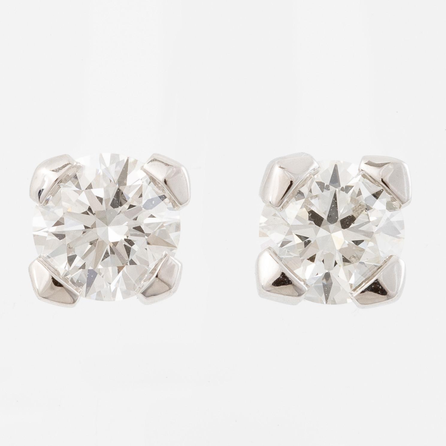 Earrings 18K white gold set with brilliant-cut diamonds, accompanied by GIA dossier.