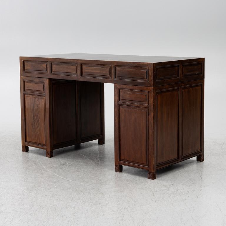 A Chinese hardwood desk, 20th century.