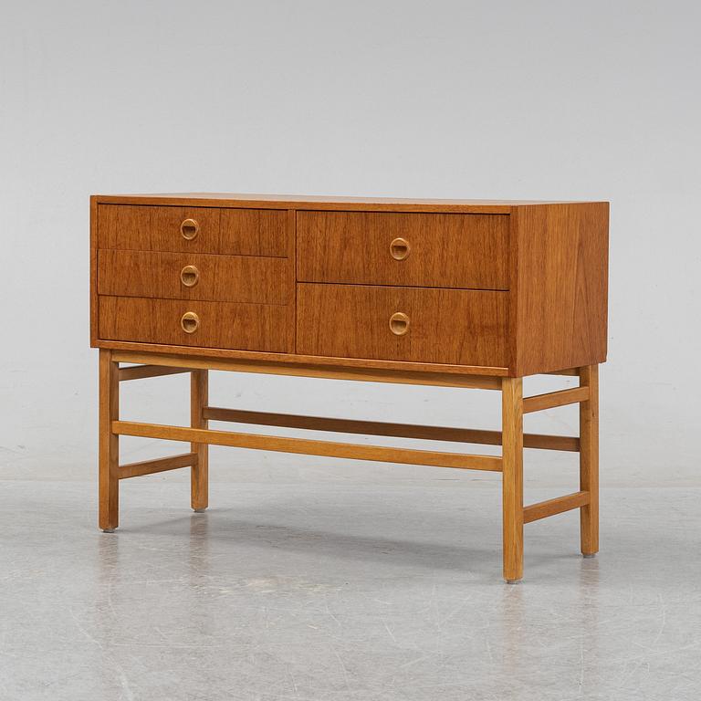 A 1950's/60's teak veneered chest of drawers.