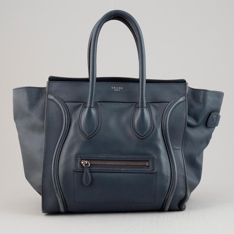 Céline, a teal leather 'Luggage' handbag.