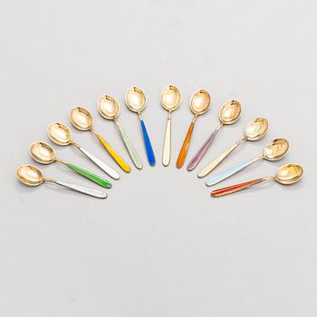 Tillander, a set of twelve enamelled gilt silver spoons, Helsinki 1951.