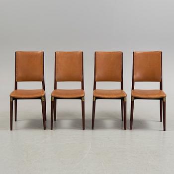 A set of four chairs by Osvaldo Borsani, Tecno, Italy.