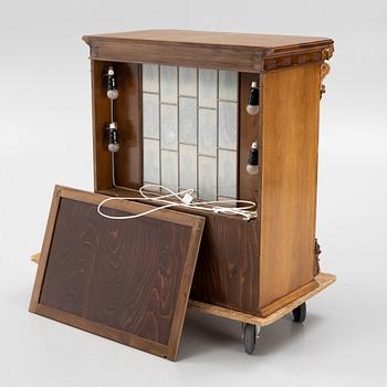 A mid 20th century bar cabinet.