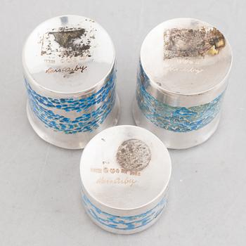 Two sterling silver and enamel miniature beakers and a small box with lid, marks of Lars Arby, Gothenburg, Sweden.