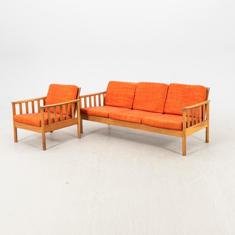 An oak easy chair ans sofa "Tiveden" by Gunnar Myrstrand & Sven Engström from the middle of the 20th century.