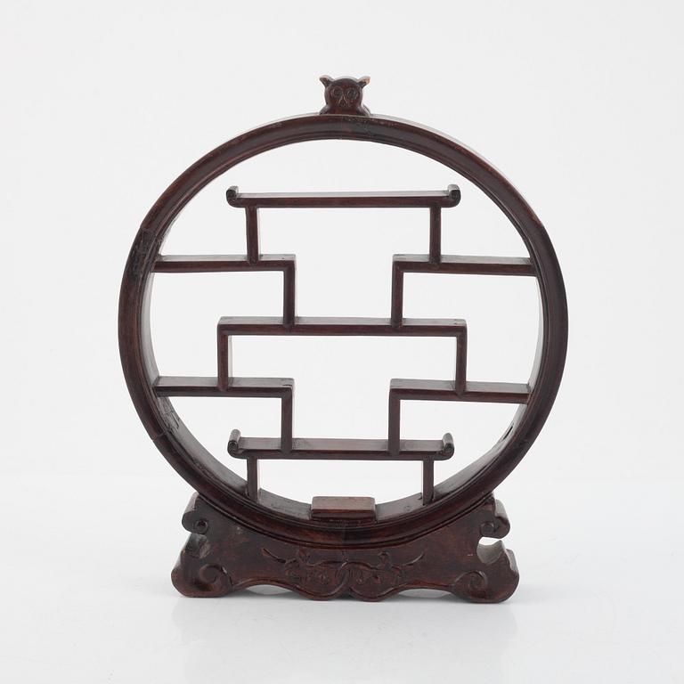 A Chinese wooden stand, 20th century.